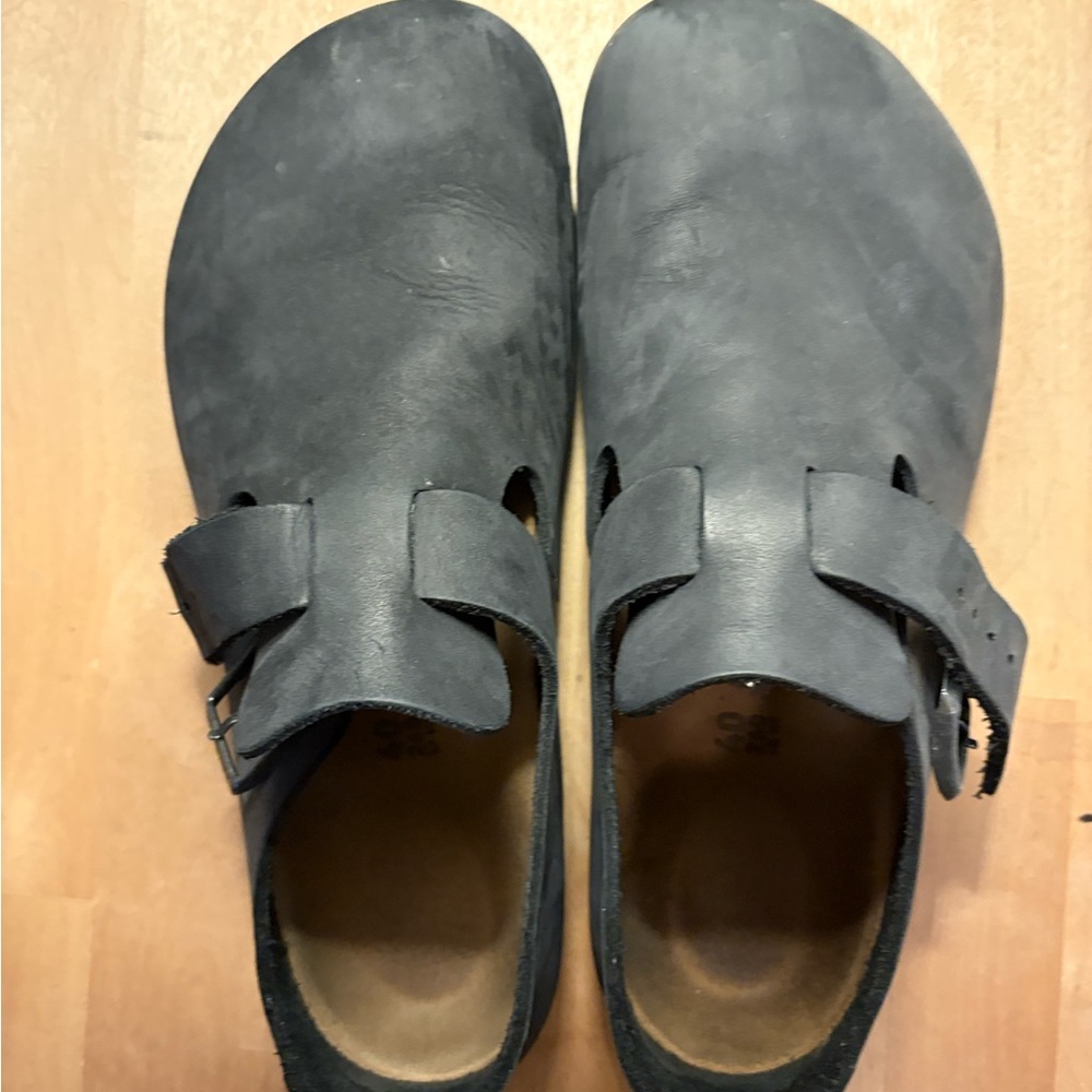 Birkenstock Black Leather Mules only worn a few times .